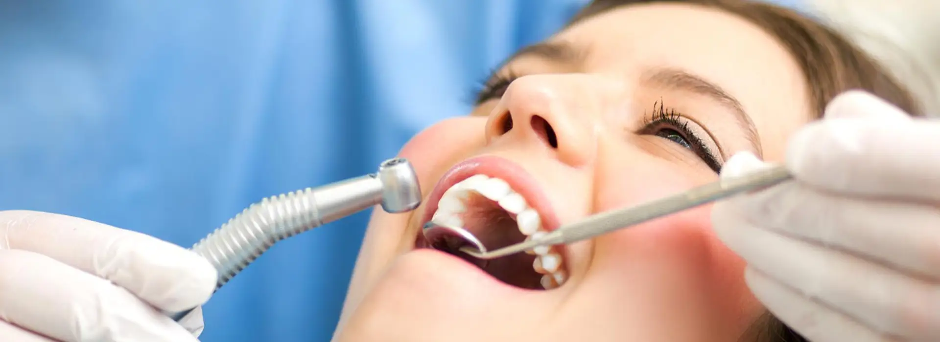 Modern dental clinic treatment room with a dentist chair